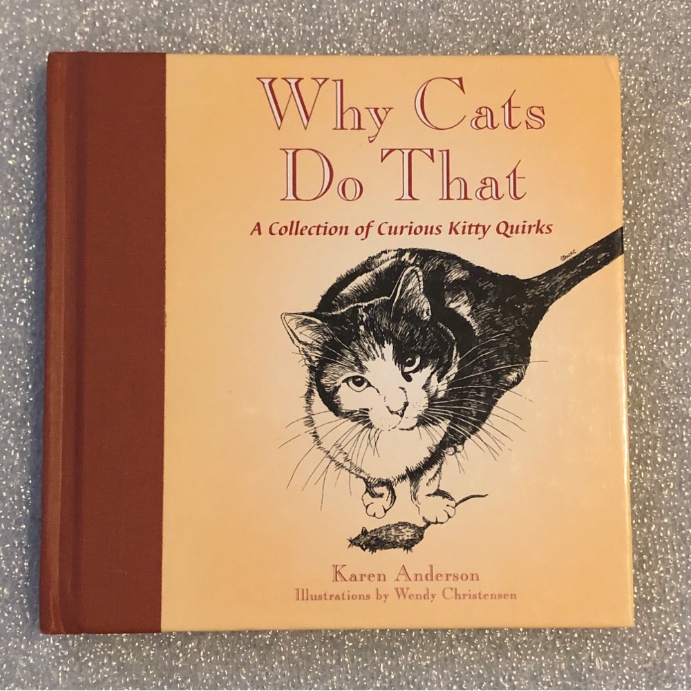 Why Do Cats Do That - A Collection of Curious Kitty Quirks - Hardcover book